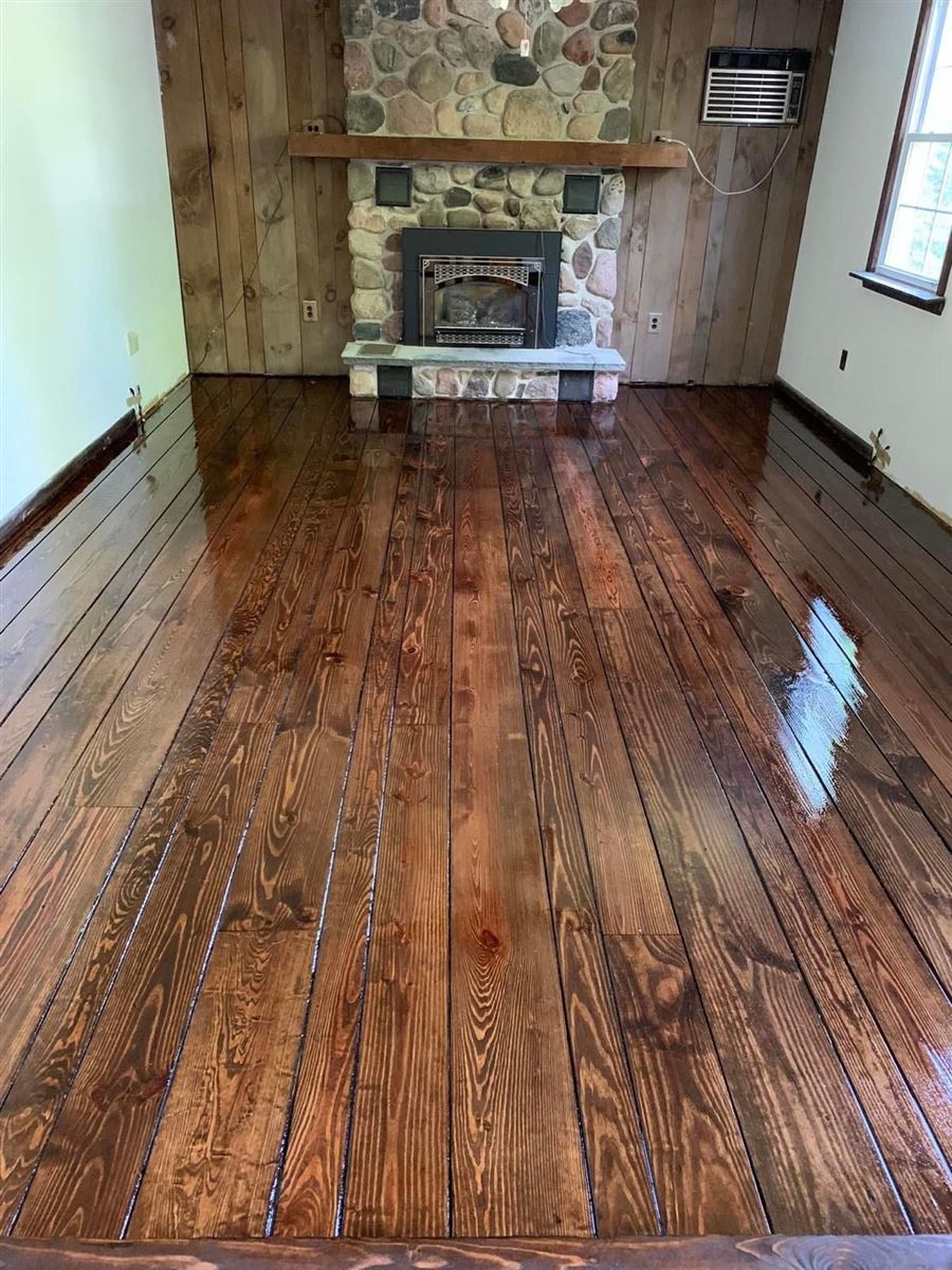 The same floor finished with a dark stain and a gloss coat