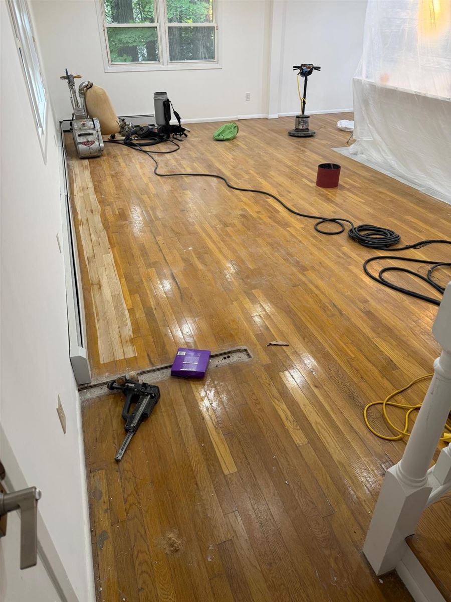 Tools and machines on an oak floor during a job