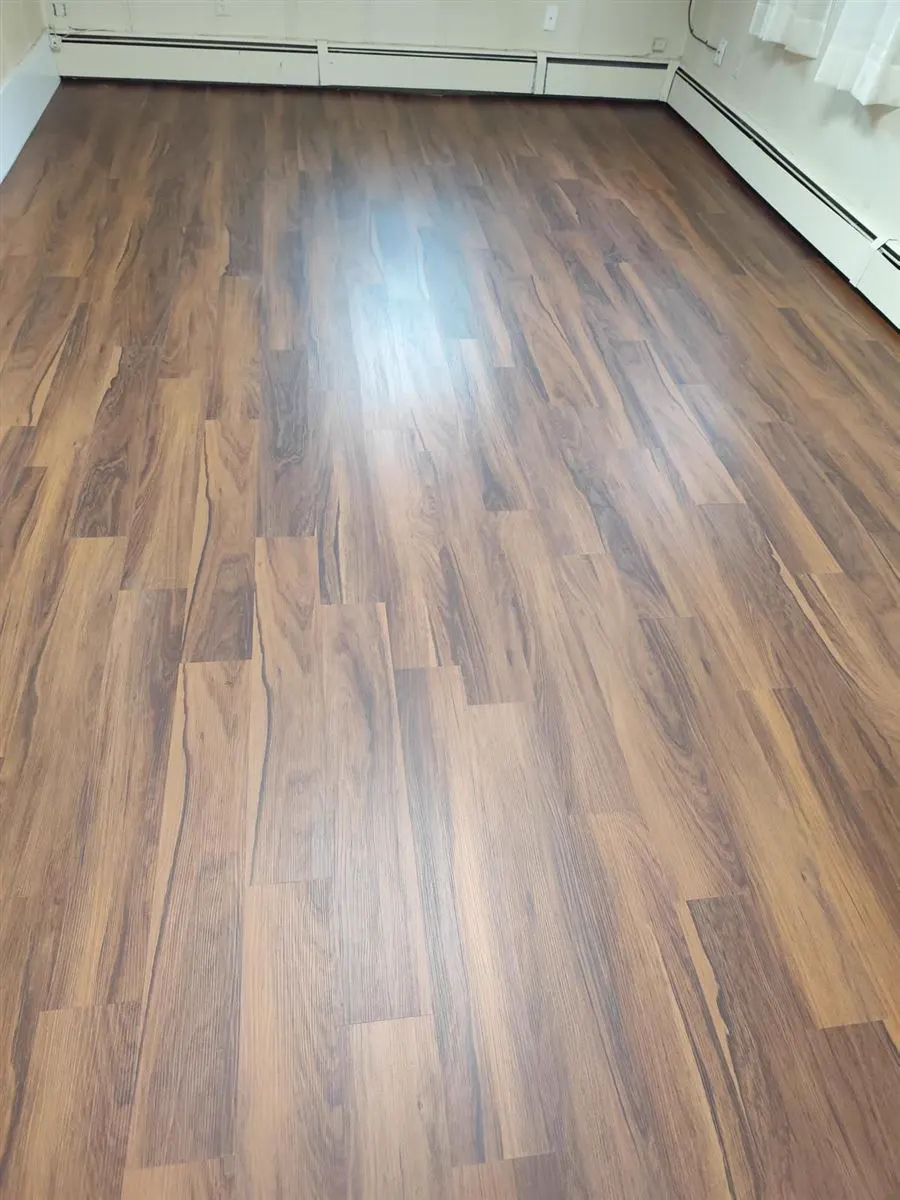 The same room with a new plank floor installed