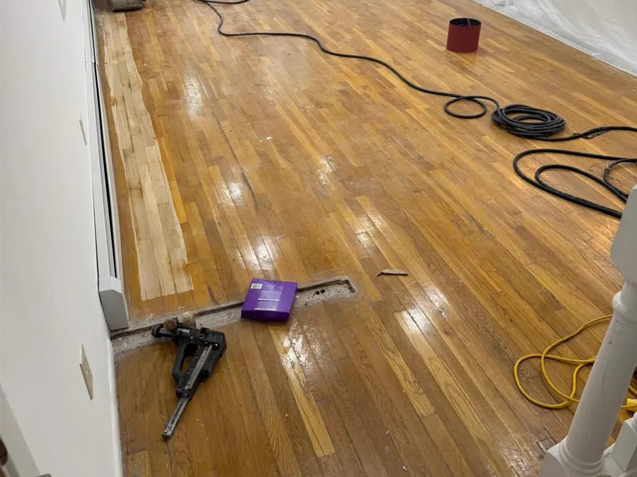 Tools and machines on an oak floor during a job